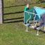 Children playing with Sensory Box playground equipment on grass