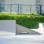 Skatepark ramp Combination 6 with greenery and fence background.