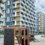 Climbing Kiosk Nature playground climbing structure with wooden frame and climbing panels in urban r