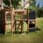 Climbing Kiosk Nature playground structure with slide and climbing elements in an outdoor setting.
