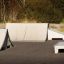 Skate ramps and platforms of Fun Box type 2 in an outdoor skatepark.