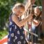 Two girls playing on Gorilla Nature playground set.