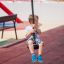 Child using Medium Cableway at playground.