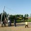 Children playing on the Silver Cableway zip line in an outdoor playground.