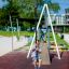 Children playing on Silver Cableway in a park.