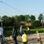 Children playing near the Silver Cableway in a park.