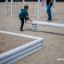 Children playing on Sandbox playground equipment in a park.