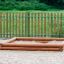 Wooden Sandbox in a Playground.