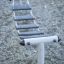 Outdoor balance beam structure named Bridge designed for playgrounds.