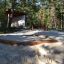 Sandbox with bark in a forest playground