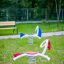 Two Yacht Swing rocking toys on a playground.