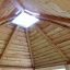 Ceiling of Firehouse wooden play shelter, interior view.