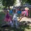 Children playing on SeeSaw playground equipment.