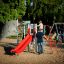 Whale - AZTEC steel structure playground with climbing wall and red slide