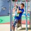 Boy playing on Whale - AZTEC steel structure at playground.