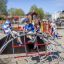 Children playing on Mini Climber steel structure in playground