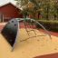 Mini Climber steel structure on a playground with a climbing net and climbing walls