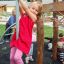 Child playing on Sherwood wooden playhouse pole.