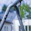 Close-up of Silver Single Swing frame with chain outdoors