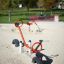 Seesaw on a sandy playground.