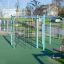 Dolphin steel structure playground equipment in a park.