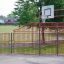 Red and grey Parc de Prince playground with basketball hoop.