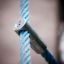 Close-up of Orca steel structure's blue rope attachment.