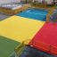 Colorful playground with divided sections for different sports activities, Maracana.