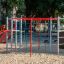 Whale steel structure playground climbing frame with ropes and slide in a park.