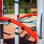 Butterfly steel structure playground equipment with red arches and blue ropes