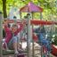 Child playing on the Butterfly steel structure playground equipment