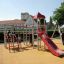 Children playing on a playground with Spider steel structure.