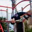 Children playing on a Spider steel structure playground equipment.
