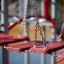 Spider steel structure with red swing bridges on playground
