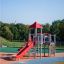 Spider steel structure playground equipment with red slide and climbing frame.