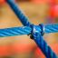 Close-up of blue ropes in Crow's Nest steel structure for playgrounds.