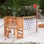 Nature Ship Sandbox, wooden playhouse with slide, climbing net, and sandbox on sandy ground.