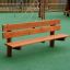 Larchwood Bench on a playground with climbing structures in the background