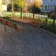 Steel Construction Table with Attached Benches in a Park.