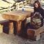 Table & Bench Nature. Wooden outdoor seating set with a table and benches in a natural setting.