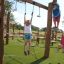 Children playing on playground with Shock Absorbing Pad 45mm with Artificial grass.