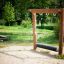 Wooden Barrel Balance Playground Equipment for Kids in Park.