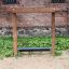 Outdoor playground equipment, Barrel wooden roller bridge for children.