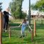 Children playing on Diamond net in a park.