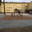Children playing on Butterfly climbing net on a school playground.
