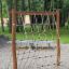 Butterfly climbing net in a wooden playground structure