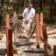 Sahara wooden playground balancing bridge for children in forest setting