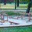 Wooden Sahara playground balance and climbing equipment in outdoor park area