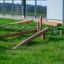Natural wooden playground set 'Gobi' on green grass.