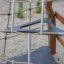 Climbing net with Tipi playground equipment in a park.